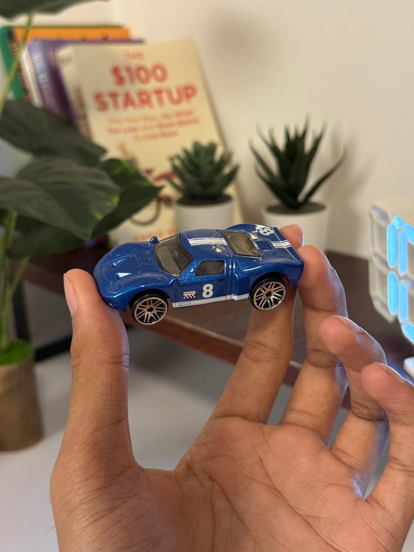 Hot Wheels Blue Racing Car #8 – Die-Cast Collectible