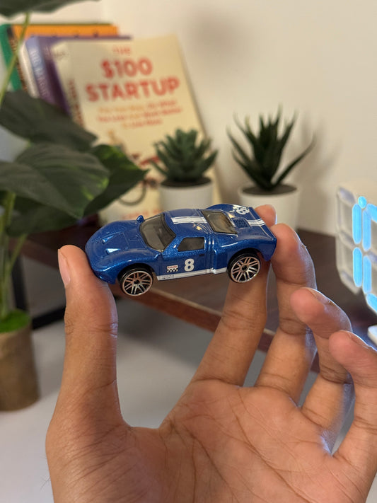 Hot Wheels Blue Racing Car #8 – Die-Cast Collectible